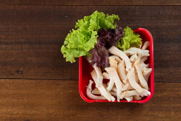 Raw beech mushrooms and fresh lettuce — Stock Photo, Image