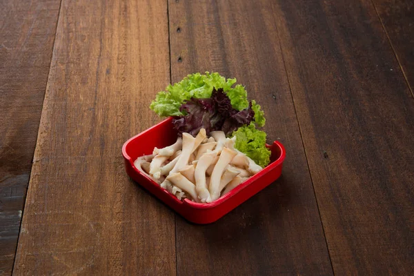 Raw beech mushrooms and fresh lettuce — Stock Photo, Image