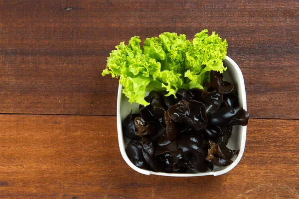 Black Chinese fungus with lettuce — Stock Photo, Image