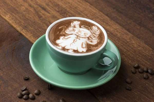 Engel Aus Kakaopulver Auf Kaffeelatte — Stockfoto