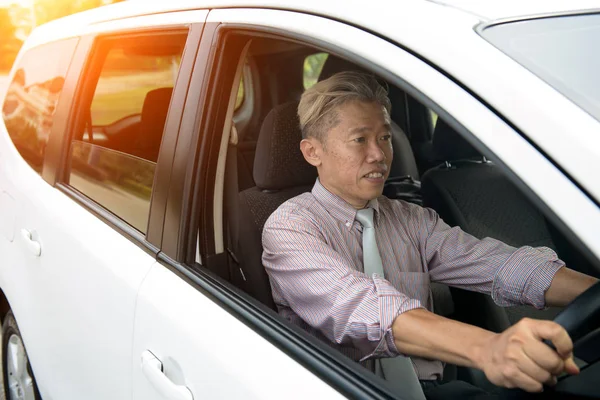 Asian Senior Male Driving — Stock Photo, Image