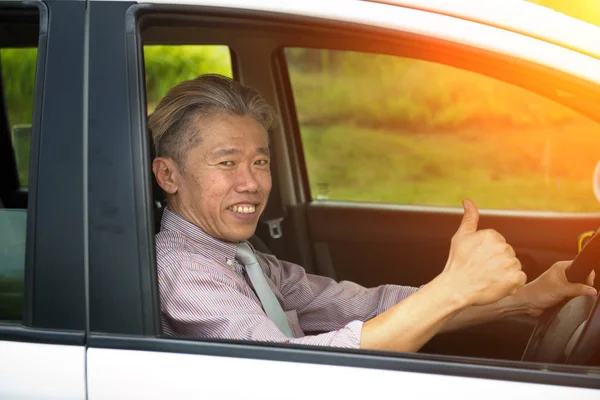 Asian Senior Male Driving Thumbs — Stock Photo, Image