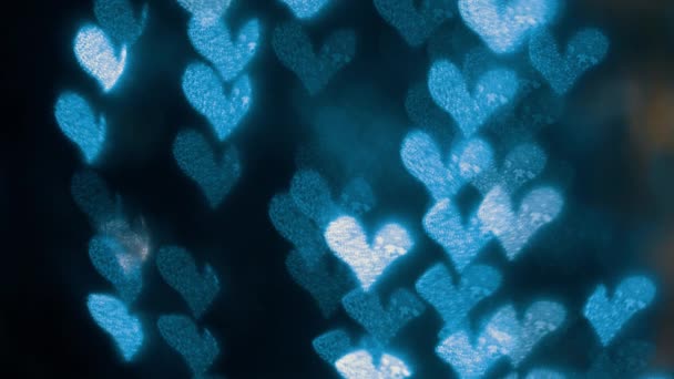 Lumières déconcentrées de guirlande dans la nuit 