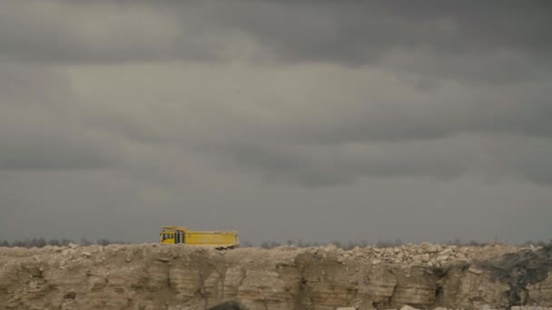 Two trucks on a road in quarry — Stock Video