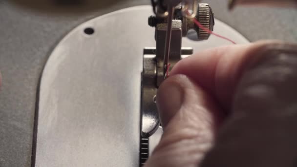 Threading the sewing machine. — Stock Video