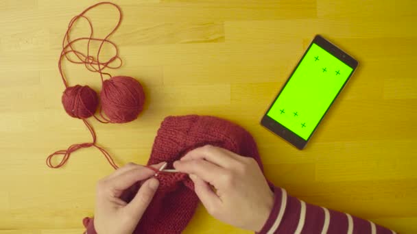 Green screen. Female hands knitting wool — Stock Video