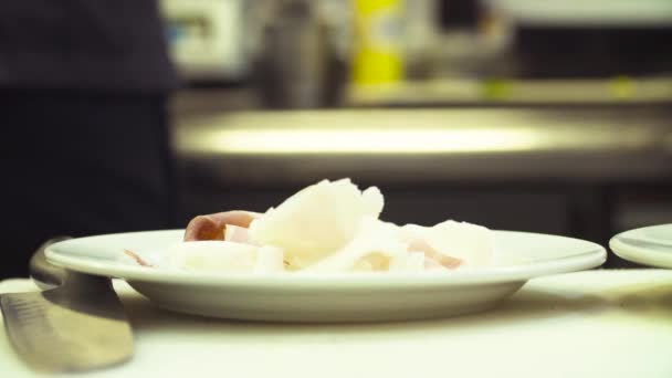 Sliced lard and ham laying on the plate — Stock Video