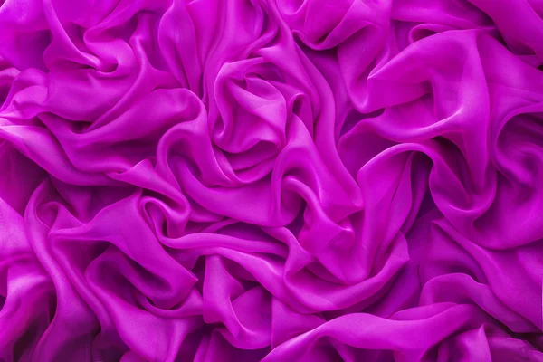 Fond en tissu de soie, vagues en tissu satiné rose, textile ondulé abstrait — Photo