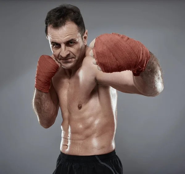 Kickbox fighter training in gym — Stock Photo, Image