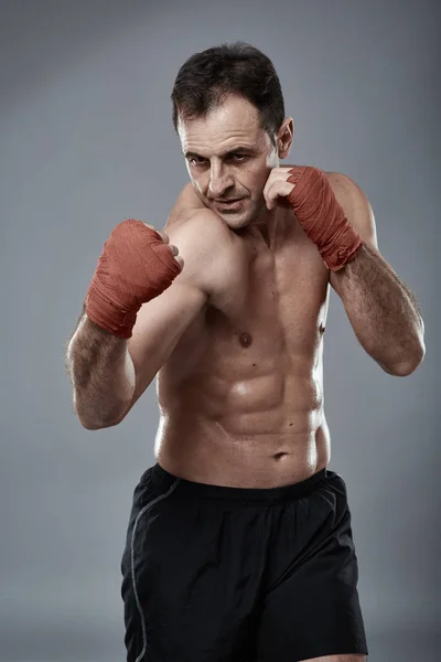 Kickbox fighter training in gym — Stock Photo, Image