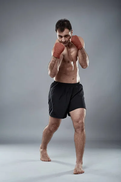 Muay thai fighter in postures — Stock Photo, Image