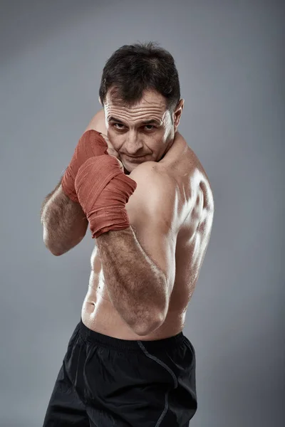 Muay thai fighter in postures — Stock Photo, Image