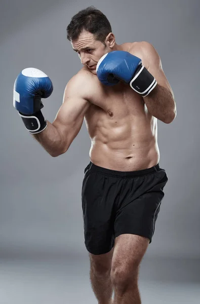 Kickbox luchador en varias posturas Imagen De Stock