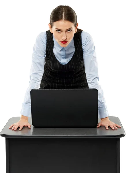 Business woman standing near her desk — стоковое фото
