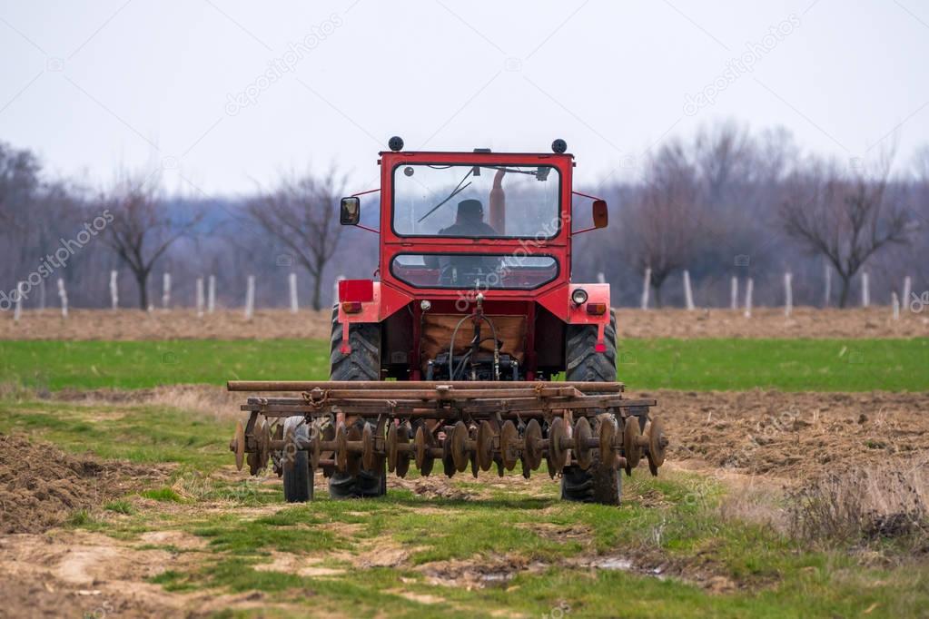 Tractor on agricultural field