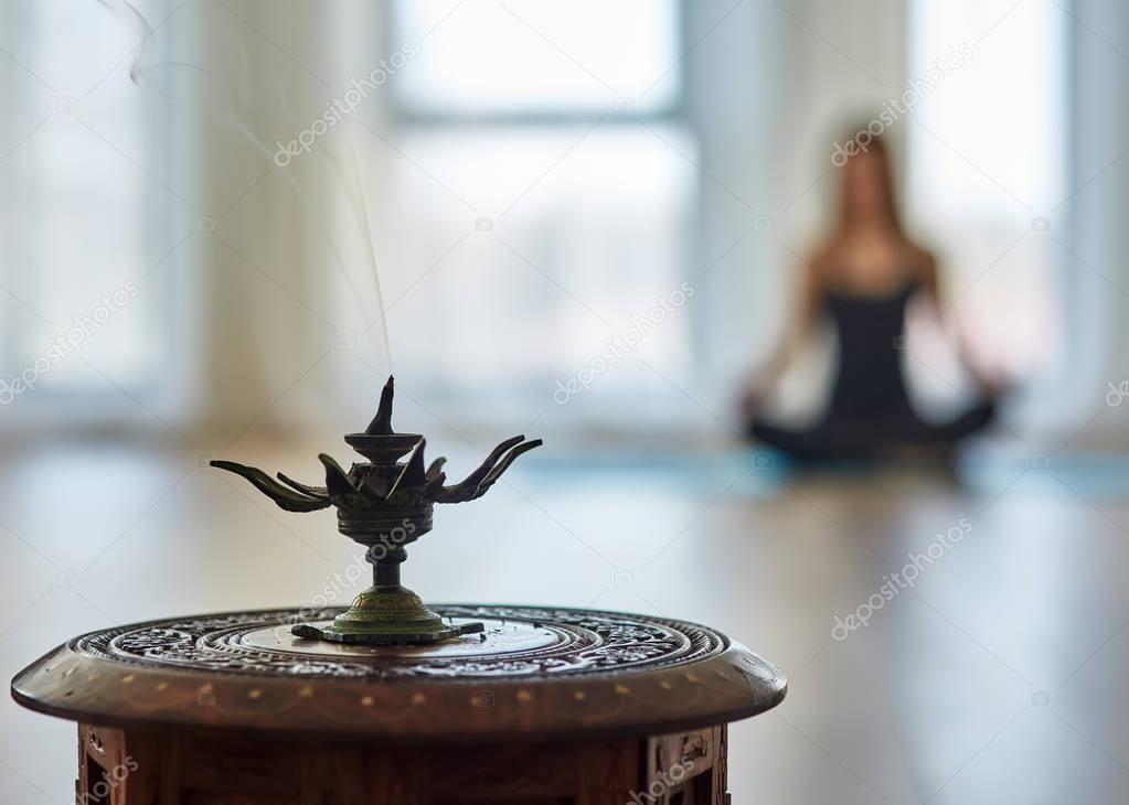 Yoga practitioner in blurred background