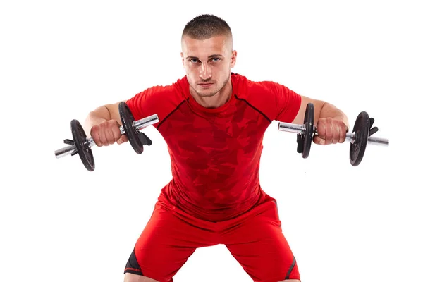 Young man in red sportswear Stock Image