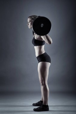 Woman doing barbell squats clipart