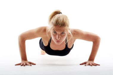 young woman doing push-ups clipart