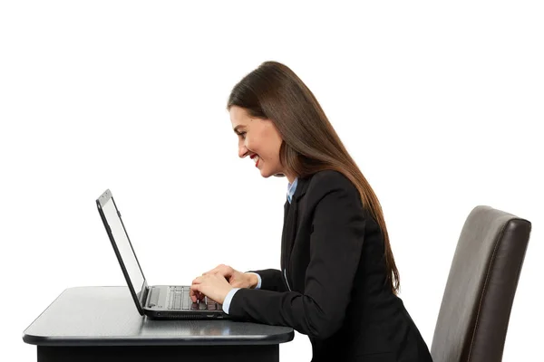 Businesswoman typing on laptop Stock Image