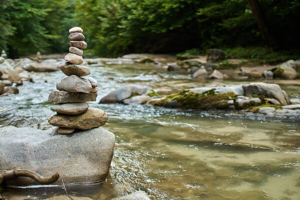Stones arranged in zen towers 