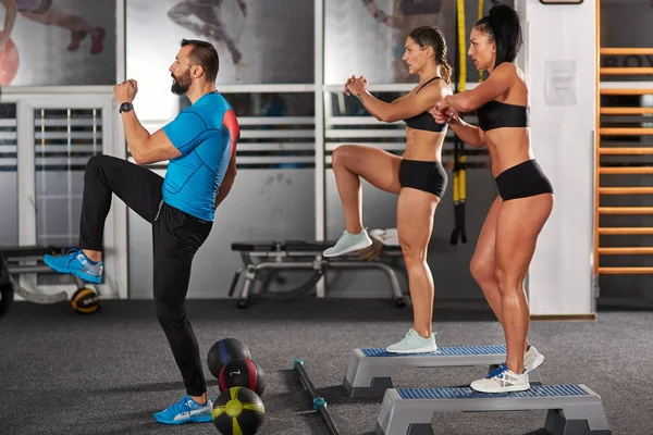 Fitness trainer and girls — Stock Photo, Image