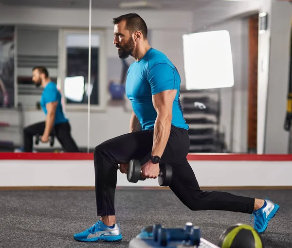 Fitness man with dumbbells — Stock Photo, Image