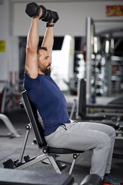 Man Doing Shoulder Workout Dumbbells Gym — Stock Photo, Image