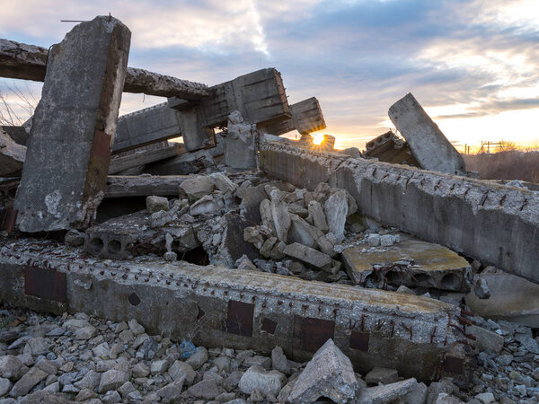 Landcape with industrial ruins at sunset