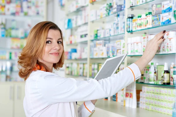 Pharmacist Checking Correspondence Medicine Data Her Tablet — Stock Photo, Image