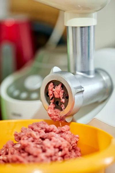 Closeup Working Meat Grinder Orange Bowl — Stock Photo, Image