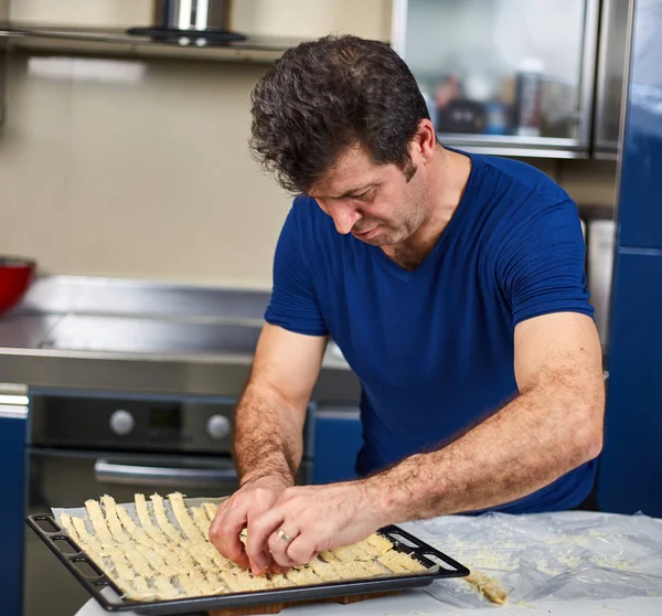 Mature Man Preparing Cheese Crackers Home Kitchen — Stock Photo, Image