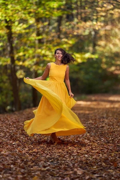 Happy Young Woman Long Yellow Dress Dancing Autumn Landscape — ストック写真