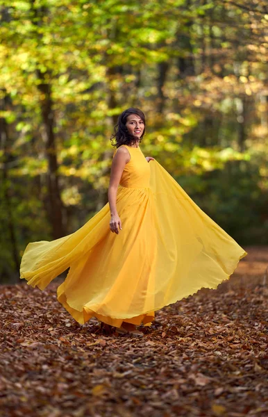 Happy Young Woman Long Yellow Dress Dancing Autumn Landscape — ストック写真