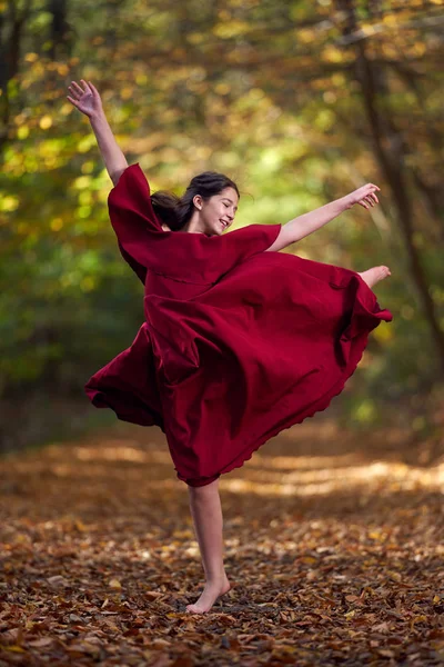 Young Teenage Girl Red Dress Dancing Forest — Stock Photo, Image