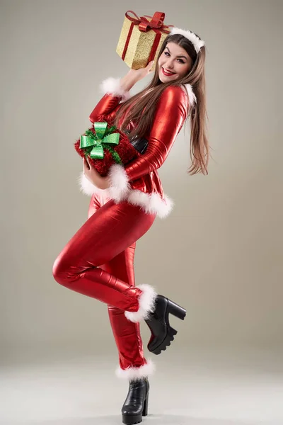 Full Length Santa Girl Bearing Presents — Stock Photo, Image