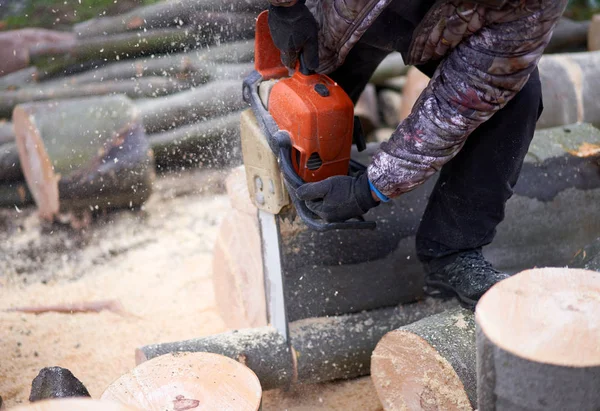 Anonymous Lumberjack Cutting Logs Chainsaw — ストック写真