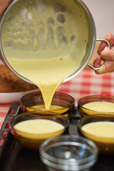 Pouring Creme Brulee Cream Small Bowls — Stock Photo, Image