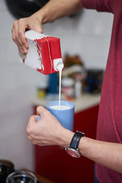 Young Man Pouring Mllk Cream Cup Recipe — Stock Photo, Image