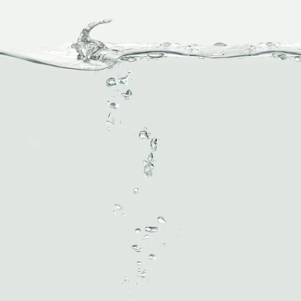 Волна воды с пузырьками воздуха — стоковое фото