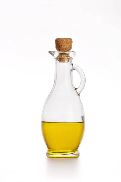 Olive oil in a bottle on white — Stock Photo, Image