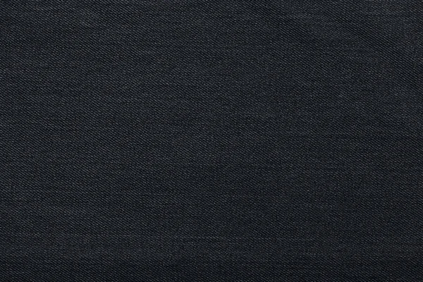 Fundo preto, fundo jeans jeans. Textura de calça, tecido . — Fotografia de Stock