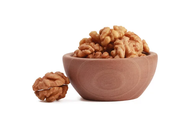 Walnuts shelled in a bowl isolated on white background. Side view. Walnut kernels in a bowl. — Stock Photo, Image