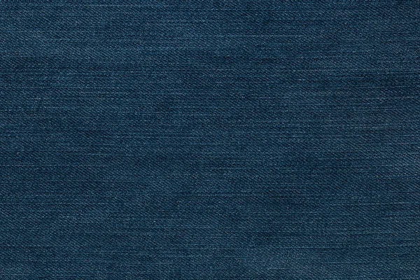 Modré pozadí, pozadí džíny denim. Džíny textura, tkanina. — Stock fotografie