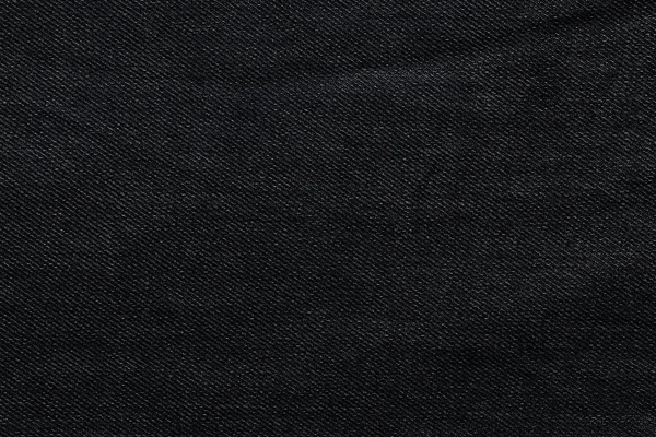 Fond noir, fond jean denim. Texture jeans, tissu . — Photo