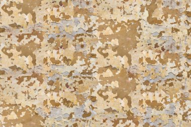 Yıpranmış ve turuncu alçı blok duvar lekeli, eski yıpranmış peeling boyalı duvar arka plan.