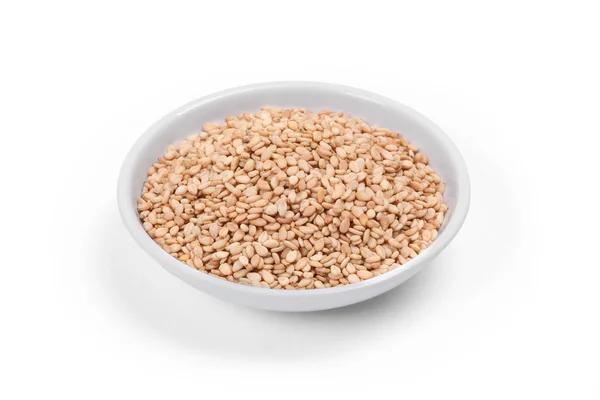 Pile of sesame. Sesame seeds on a saucer — Stock Photo, Image