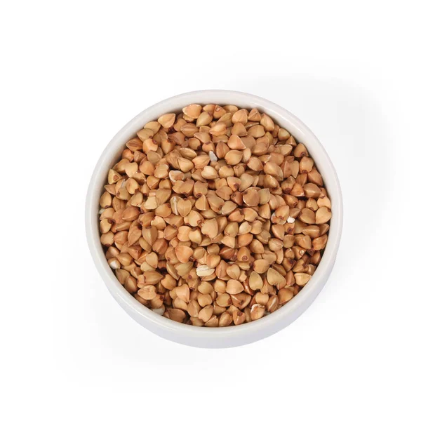 Buckwheat groats in whitebowl isolated on white background — Stock Photo, Image