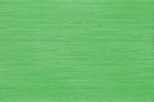 Green colored wood. Green wood texture background.