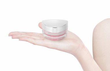 Pembe üçgen kozmetik kavanoz izole elde